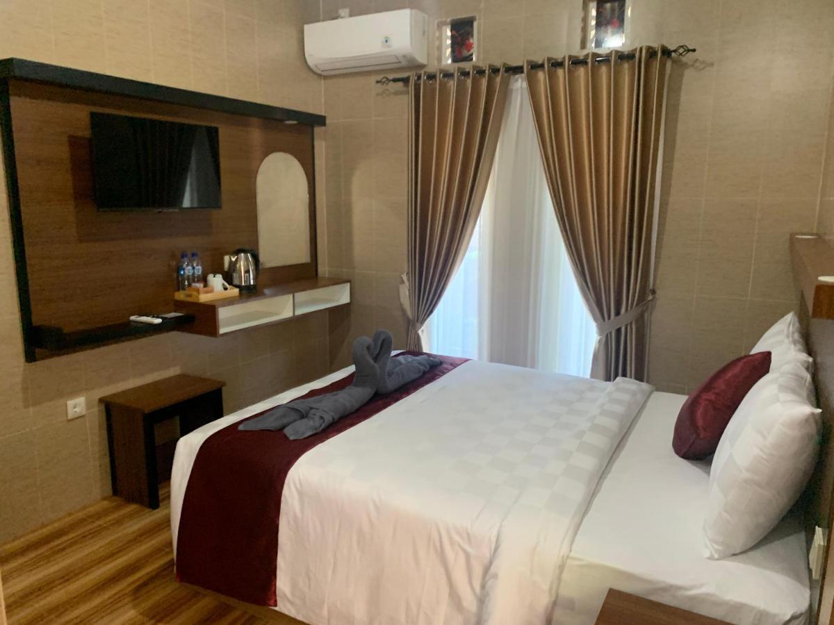 Tirtasuci House Inn *